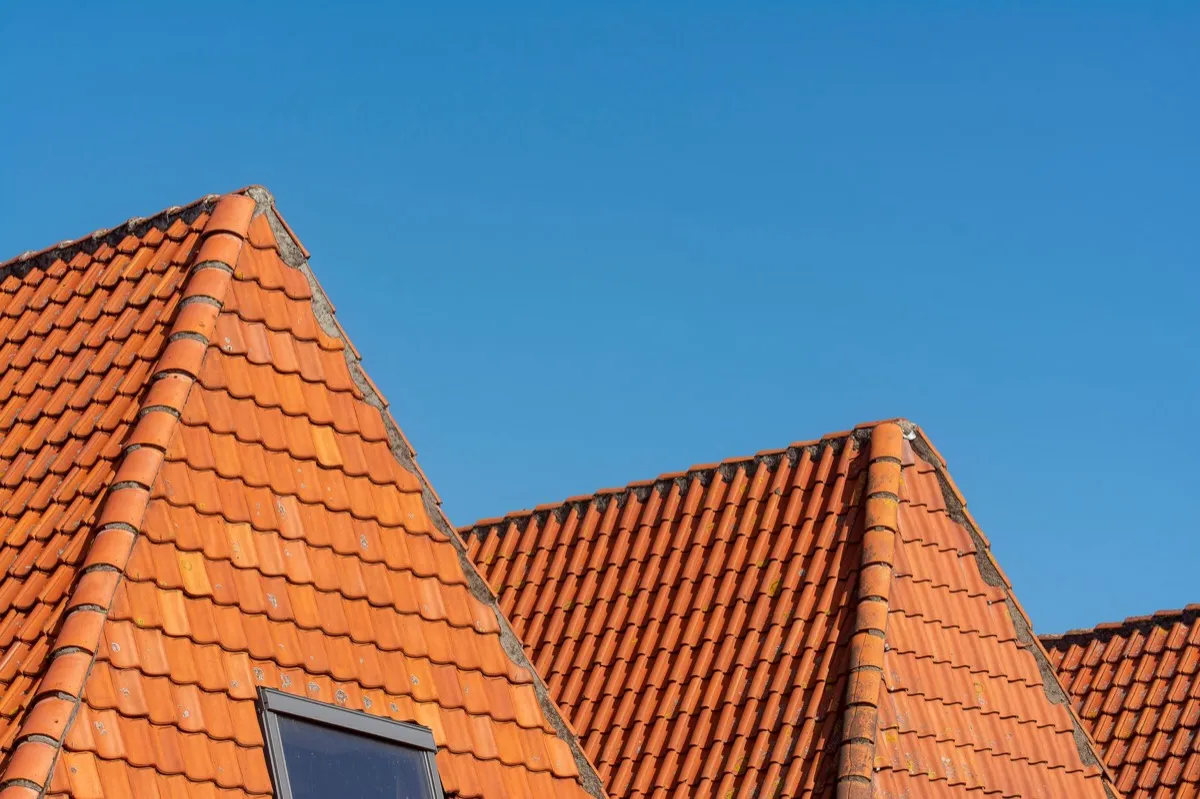 Clay barrel tile rooflines on homes in Edmond, OK